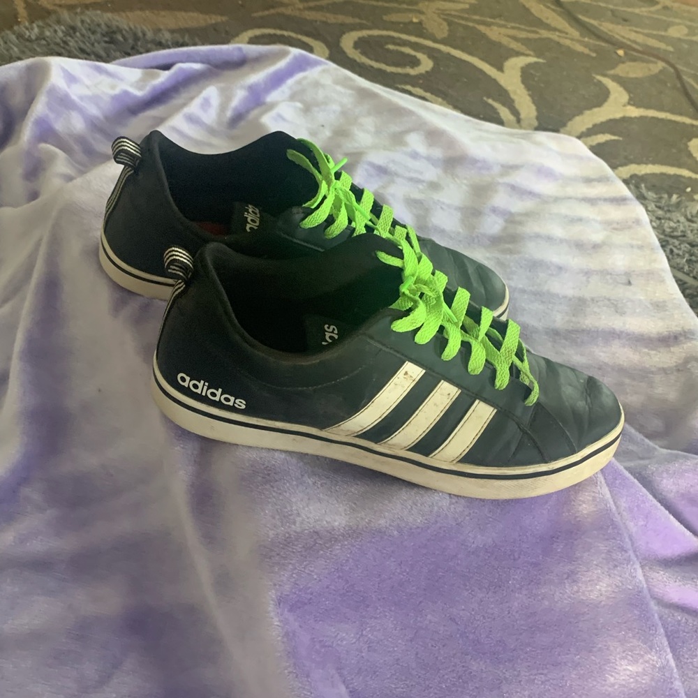 Black adidas shoes with white stripes size 10